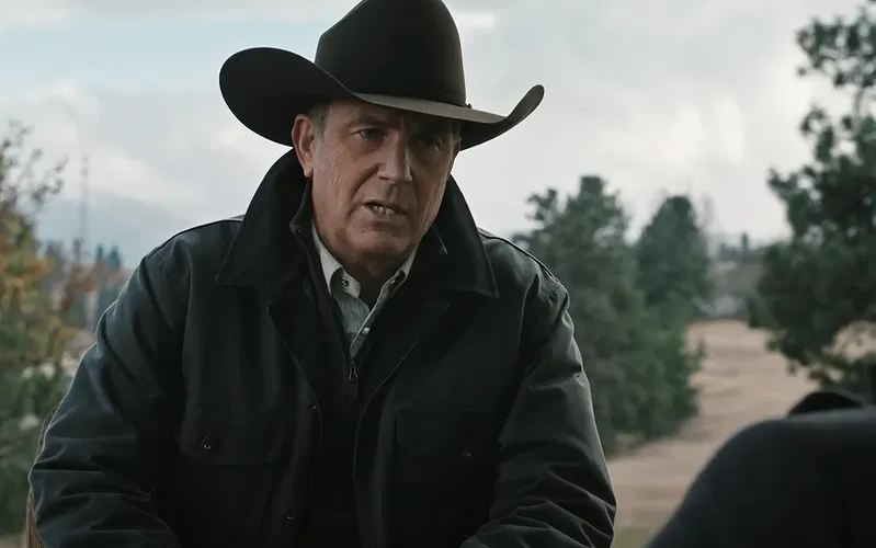 Kevin Costner in an all-black outfit Yellowstone.