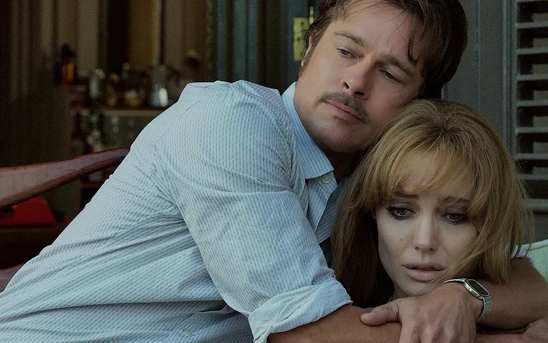 Brad Pitt embraces Angelina Jolie in By The Sea