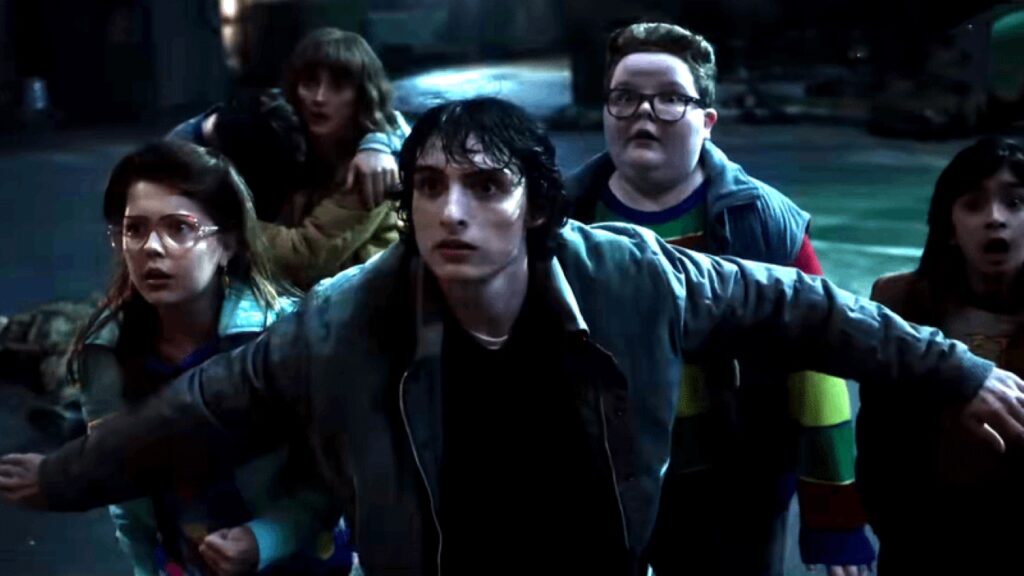 Mike peotecting the kids and Derek behind Mike in Stranger Things season 5 teaser