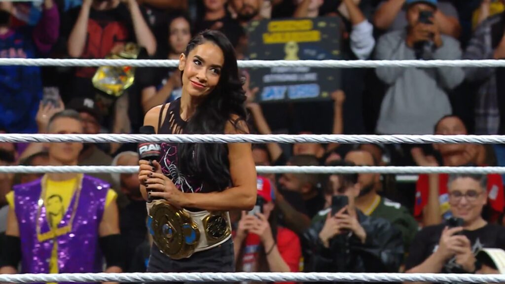 What Do We Know About AJ Lee's WWE Return After the Becky Lynch Clash? 32 AJ Lee on RAW with the Women's Intercontinental Championship around her waist