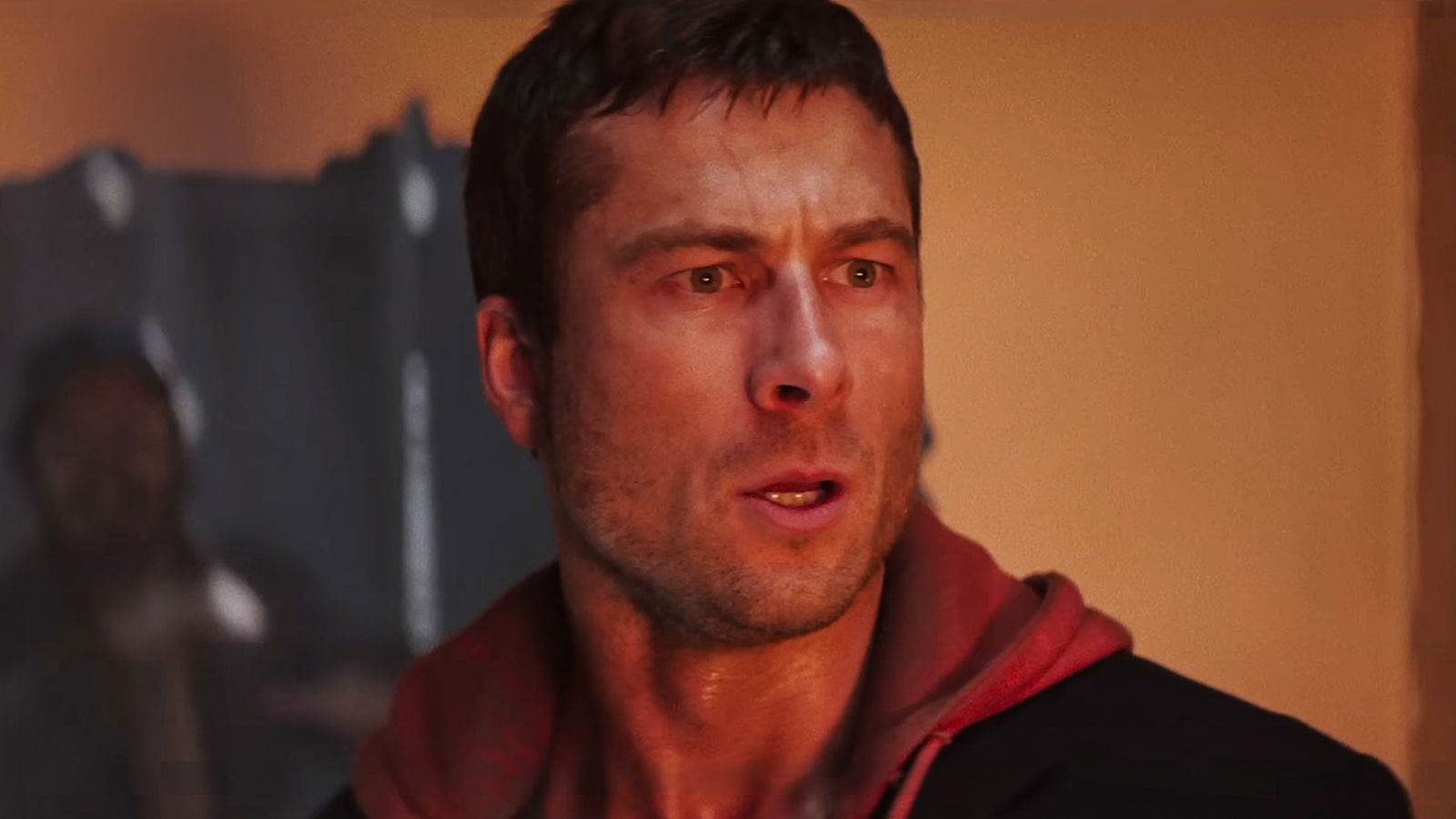 Arnold Schwarzenegger Reveals If Glen Powell’s The Running Man Is Better Than the Original 1 Glen Powell looking shocked in The Running Man