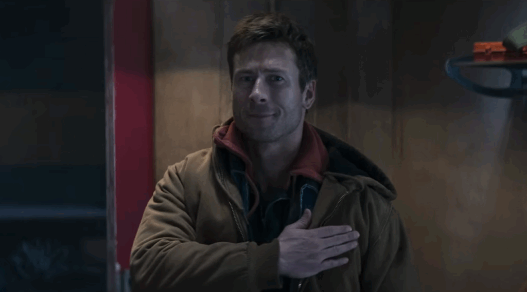 Glen Powell Was Almost Fired From an Arnold Schwarzenegger Movie Before Replacing Him 1 Glen Powell in a still from The Running Man 2025