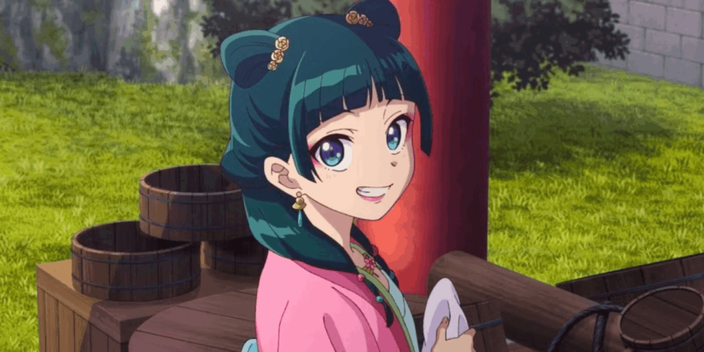 Maomao with makeup on and smiling in The Apothecary Diaries.