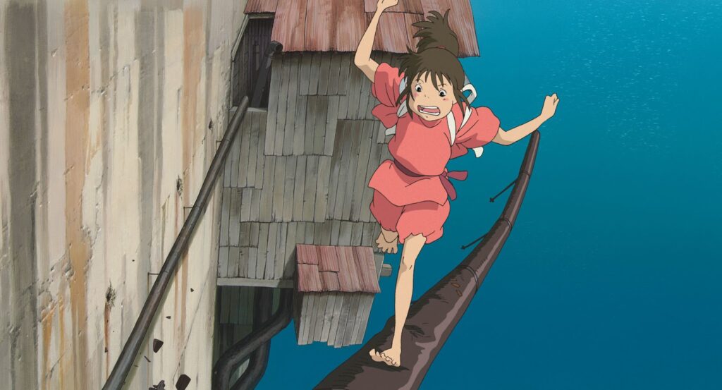 Chihiro running and balancing on the pipes in Spirited Away