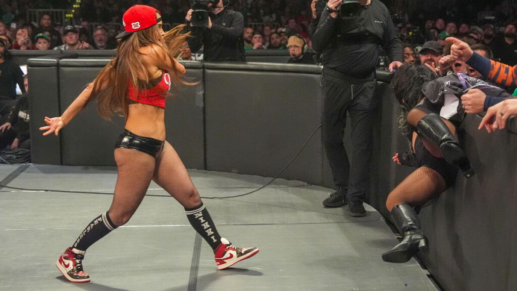 Nikki Bella attacking. 