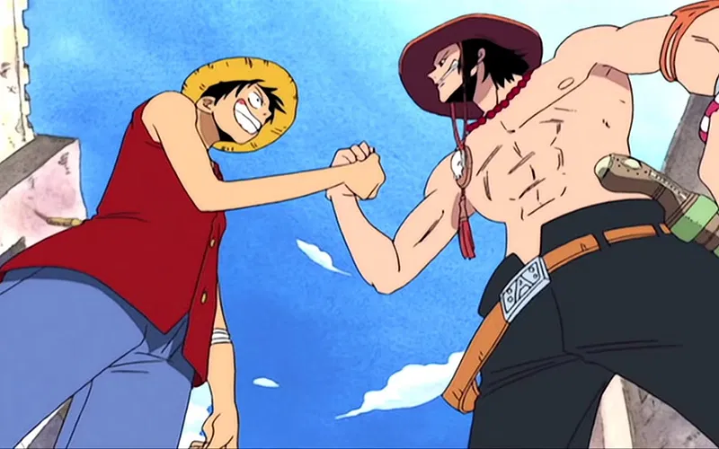 Ace và Luffy bắt tay nhau trong One Piece.