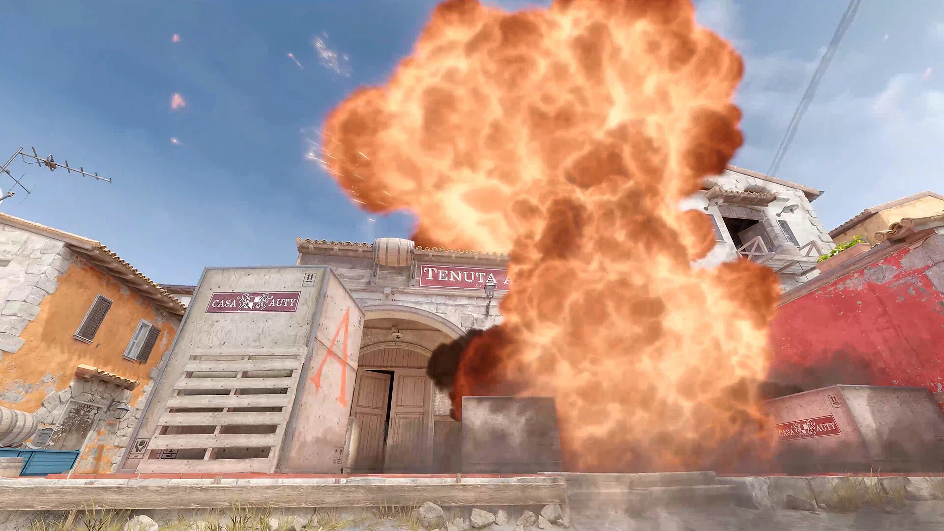 What Is Animgraph 2 in Counter-Strike 2? Everything You Need to Know 18 Counter-Strike 2 gameplay screenshot showing a large explosion at a bomb site in the map Inferno.