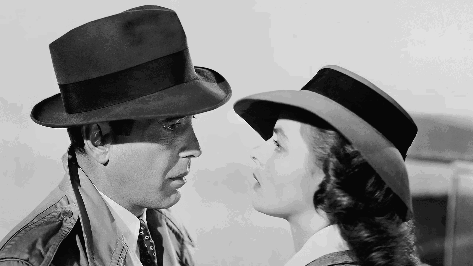 Humphrey Bogart as Rick Blaine along side Ingred Bergman in Casablanca. 