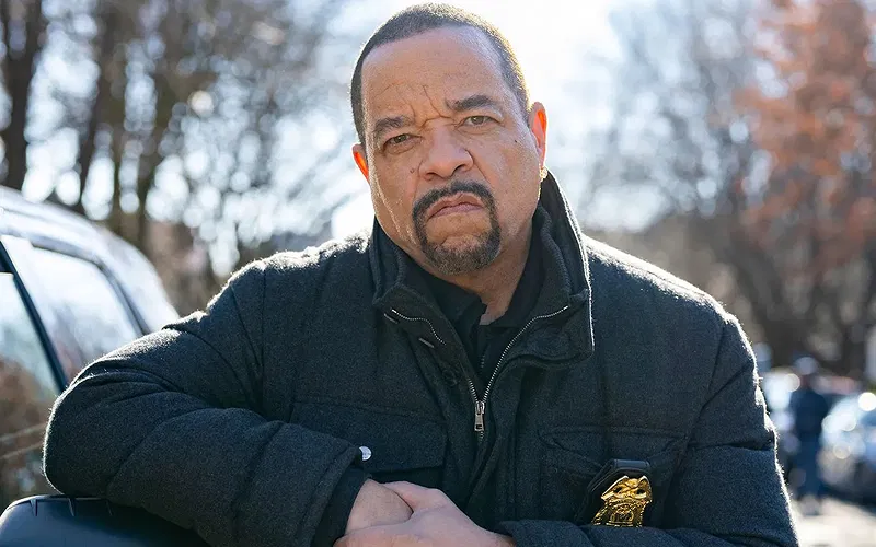 Ice-T as Sergeant Odafin Fin Tutuola in Law & Order: Special Victims Unit wearing his NYPD badge and jacket