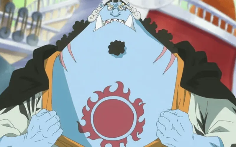 Jinbe shows his Sun Pirate tattoo in One Piece.