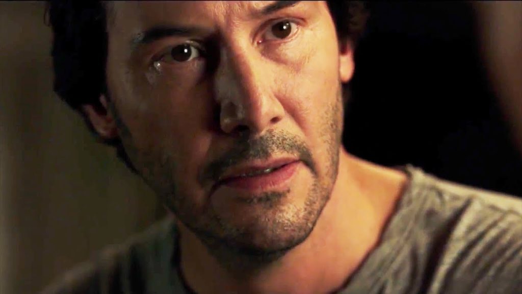 Keanu Reeves looking concerned in Replicas