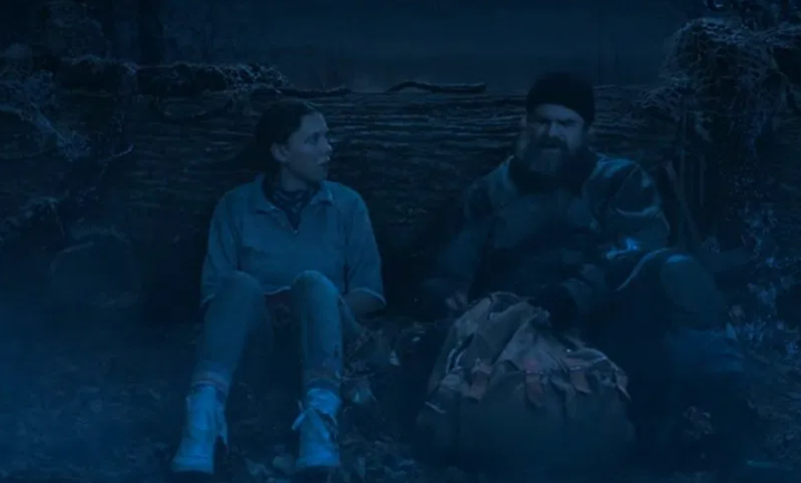Hopper and Eleven are sitting next to each other.