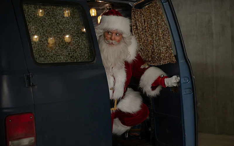 A still from My Secret Santa featuring Santa Claus getting out of a van