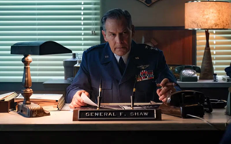 IT: Welcome to Derry Season 1 Confirms What Fans Have Always Feared About Pennywise General Shaw in military uniform inside office in IT Welcome to Derry