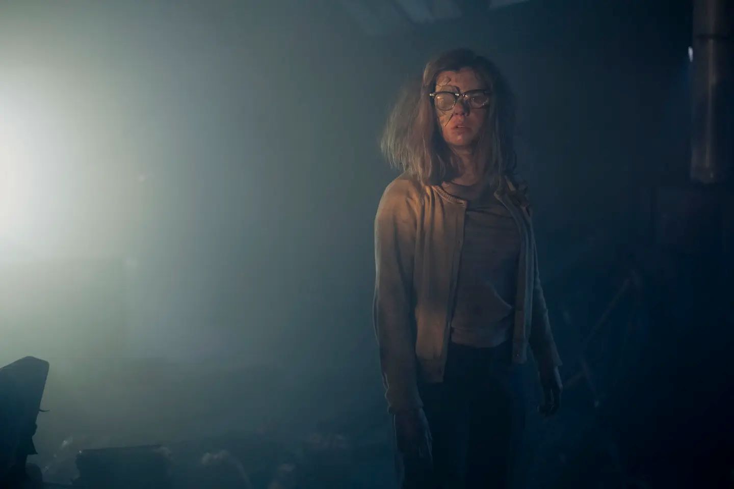 Marge in a dark room, one eyes covered in  IT Welcome to Derry