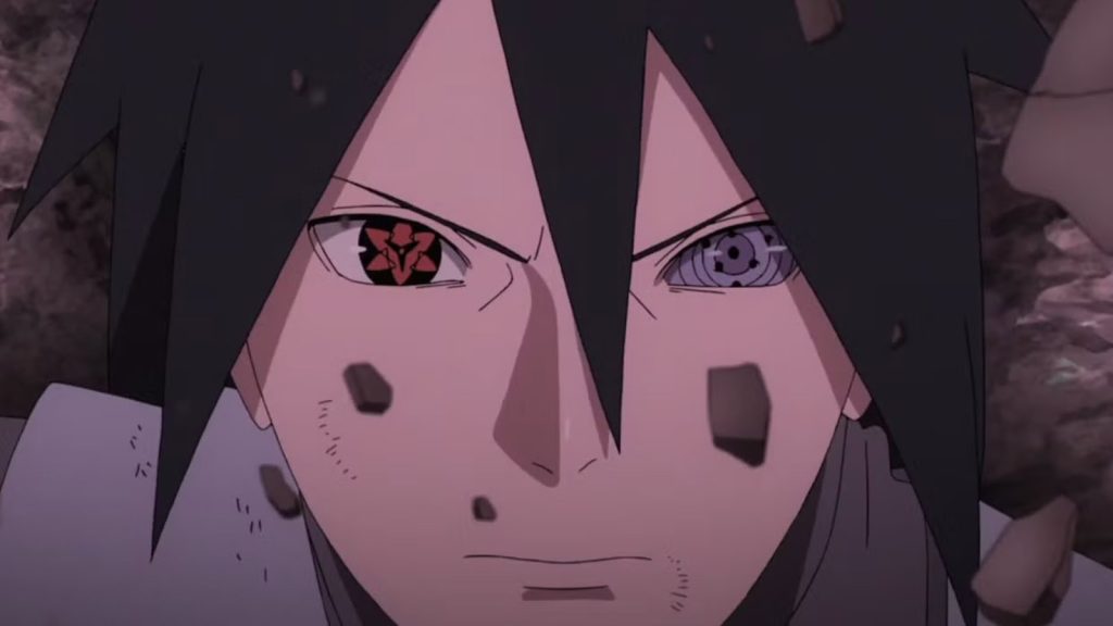 Sasuke with the Rinnegan in his left eye and the Mangekyo Sharingan in his right eye.