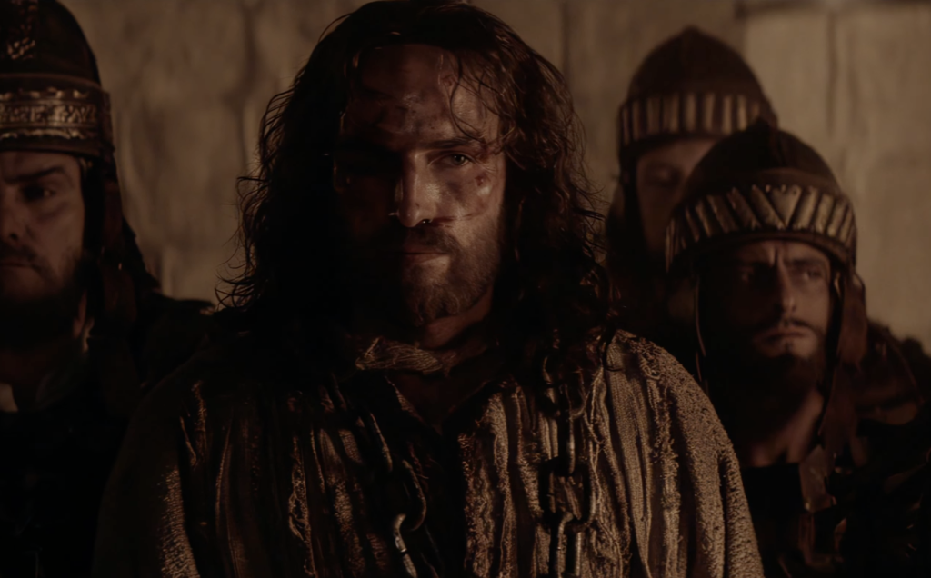 Jesus held prisoner in The Passion of the Christ, streaming this weekend on Netflix 