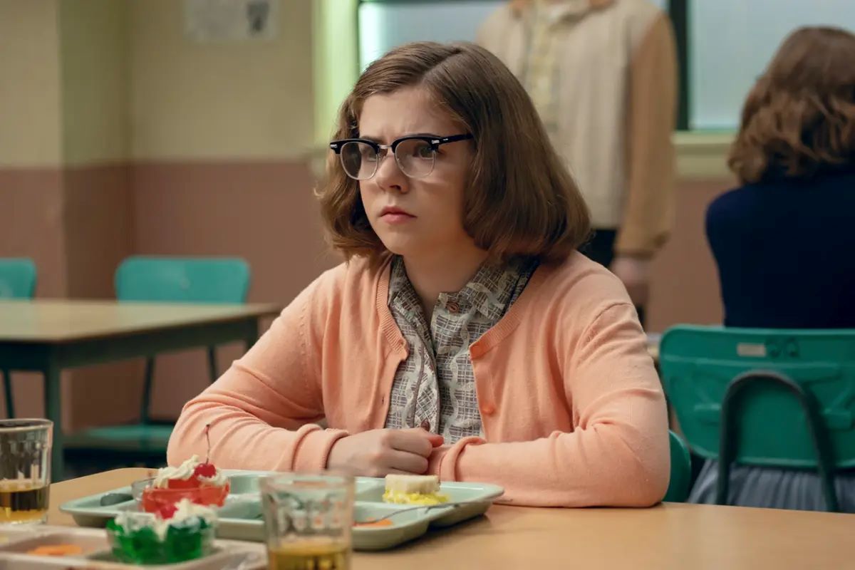 Marge, sitting in a school lunch table in IT: Welcome to Derry