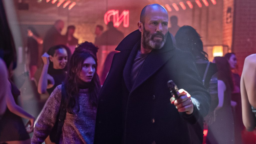image of jason statham with a gun in club from shelter movie