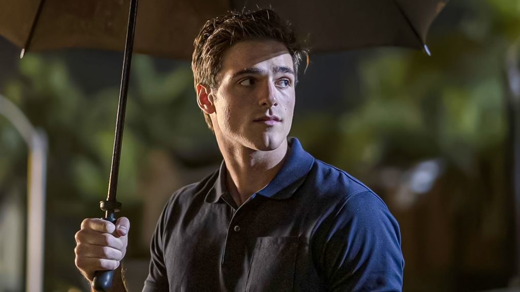 jacob elordi as nate holding umbrella in euphoria