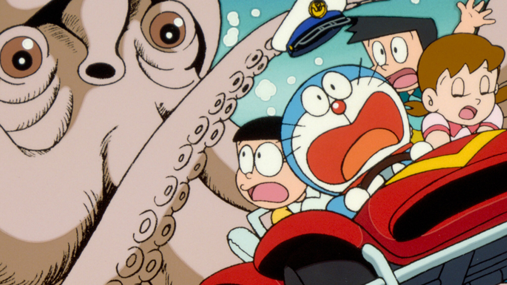 Doraemon, Nobita, Shizuka, and Sunio running away from an octopus in a car