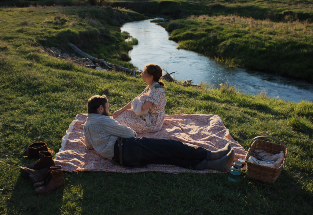 A family having a picnic by the river 