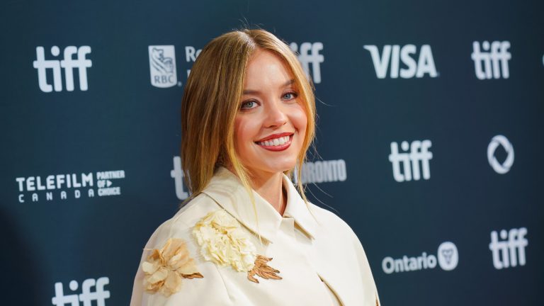 still of sydney sweeney in white dress