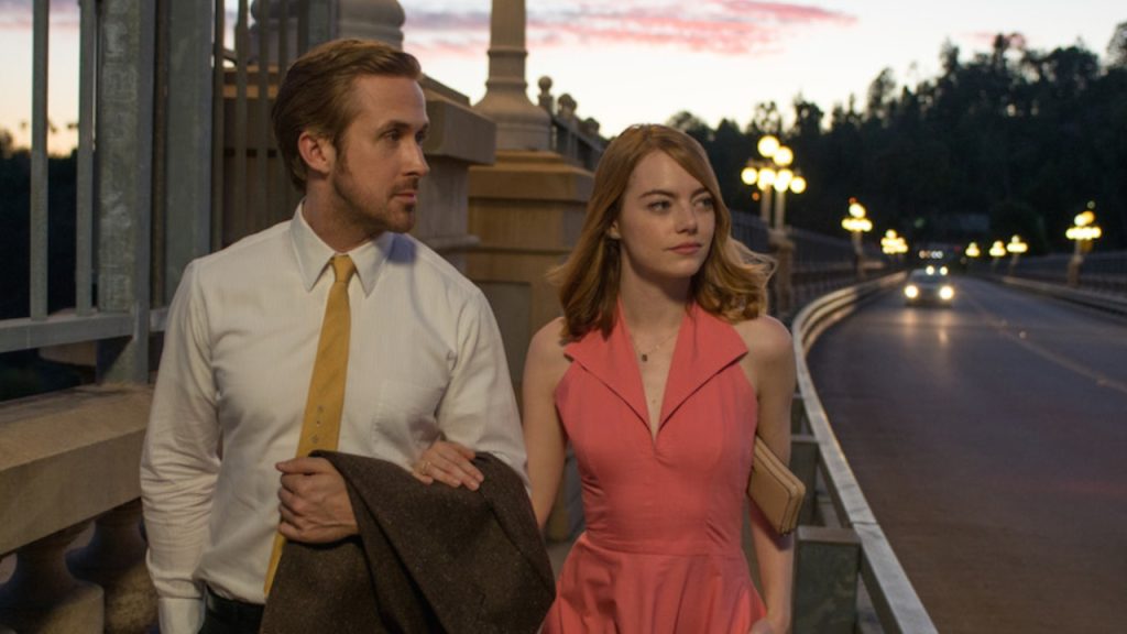 Ryan Gosling and Emma Stone, walking together 