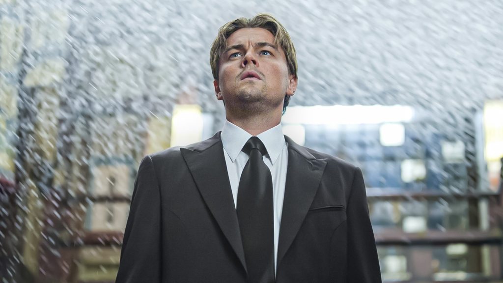 38 Years Later, The Anime Movie That Inspired The Matrix and Inception Returns to IMAX 8 leonardo dicaprio as cobb standing in the rain while looking up in inception