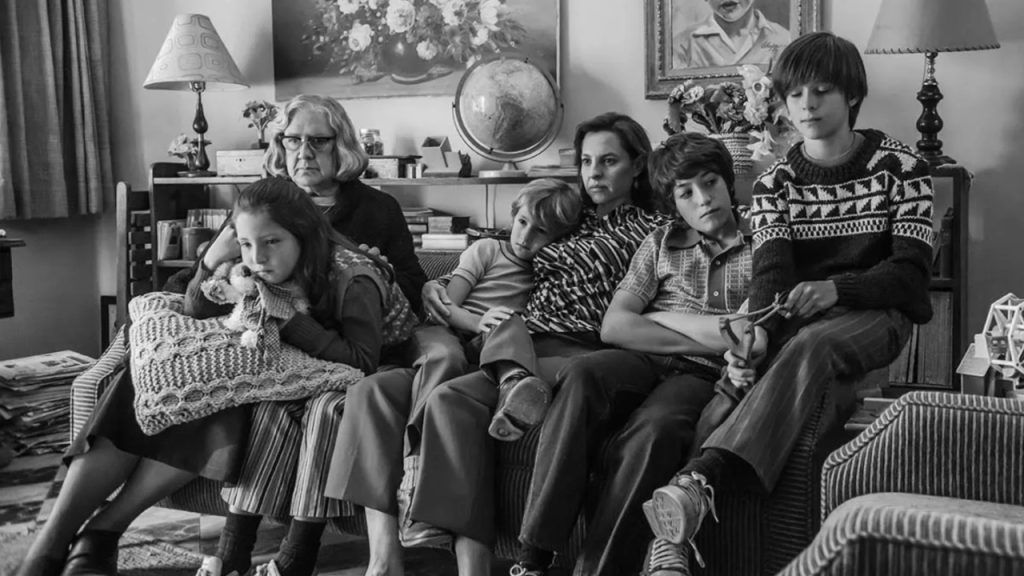 Yalitza Aparicio and Marina de Tavira with the children in a family scene from Roma (2018)
