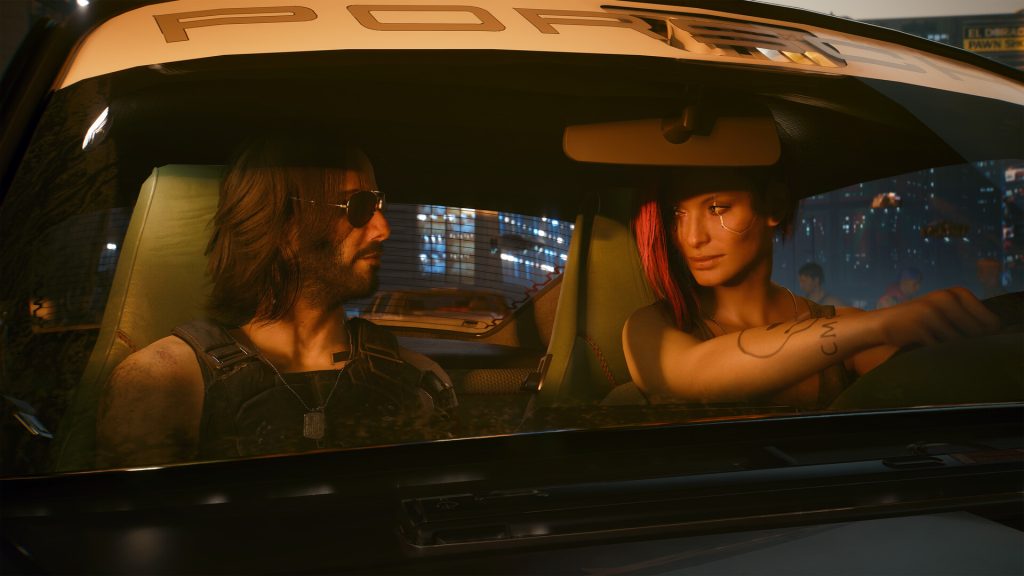 Johnny and V inside the Porsche in Cyberpunk 2077: Ultimate Edition.