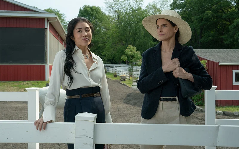 The Theory Behind Ashe’s Master Plan 16 Your Friends & Neighbors Season 2 stars Eunice Bae and Amanda Peet in "Your Friends & Neighbors," premiering April 3, 2026 on Apple TV.
