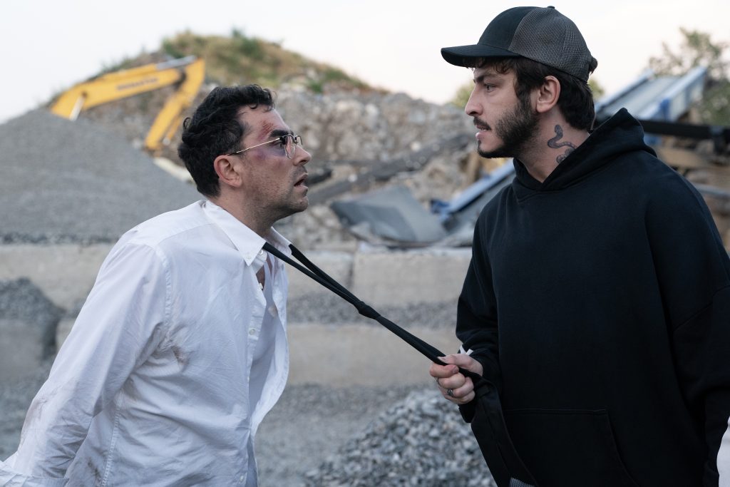 (L to R) Dan Levy as Nicky and Boran Kuzum as Yusuf in BIG MISTAKES. 