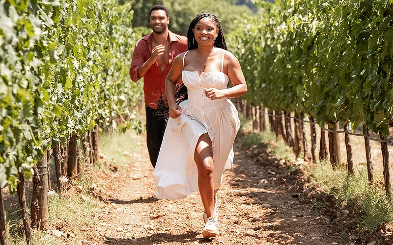 Surprisingly Riveting Rom-Com Breathes New Life into Tired Tropes 3 (from left) Michael (Regé-Jean Page) and Anna (Halle Bailey) in You, Me and Tuscany, directed by Kat Coiro.