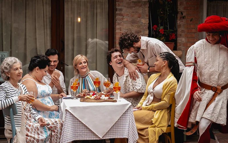 Surprisingly Riveting Rom-Com Breathes New Life into Tired Tropes 29 (from left) Nonna Alessia (Stefania Casini), Francesca (Stella Pecollo), Leo (Luca Setaccioli), Gabriella (Isabella Ferrari), Enzo (Tommaso Cassissa), Matteo (Lorenzo de Moor) and Anna (Halle Bailey) in You, Me and Tuscany, directed by Kat Coiro.