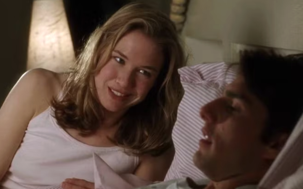 Dorothy and Jerry, lying on the bed 