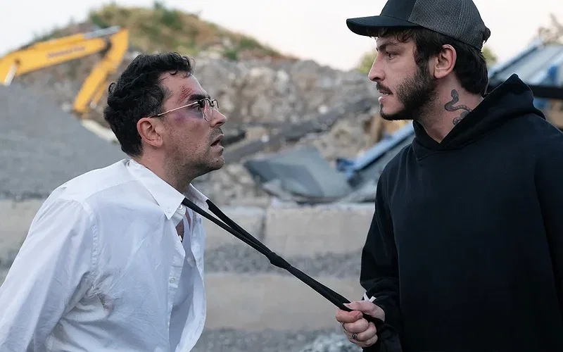 The Most-Asked Questions About Big Mistakes, Answered 17 Dan Levy and Boran Kuzum in a still from Big Mistakes