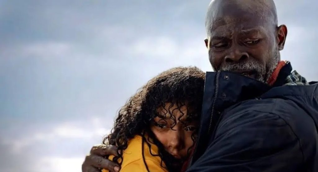 Dakota and Dale hugging after the rescue in Thrash