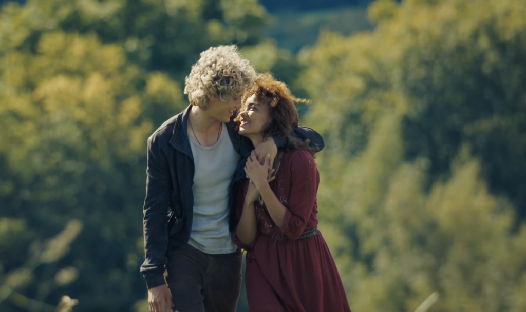 Haymitch and his girlfriend Lenore Dove Baird, embracing each other 