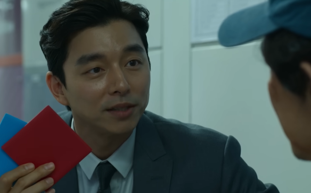 The recruiter offering to play ddakji with Gi hun in Squid Game season 1 