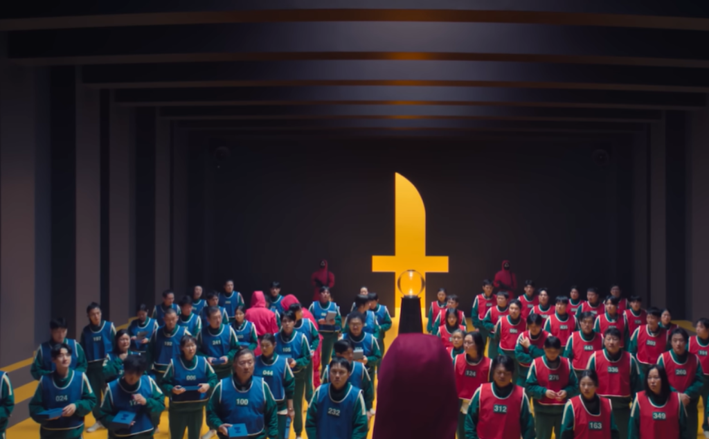 Players getting instructed to play hide and seek in Squid Game Season 3