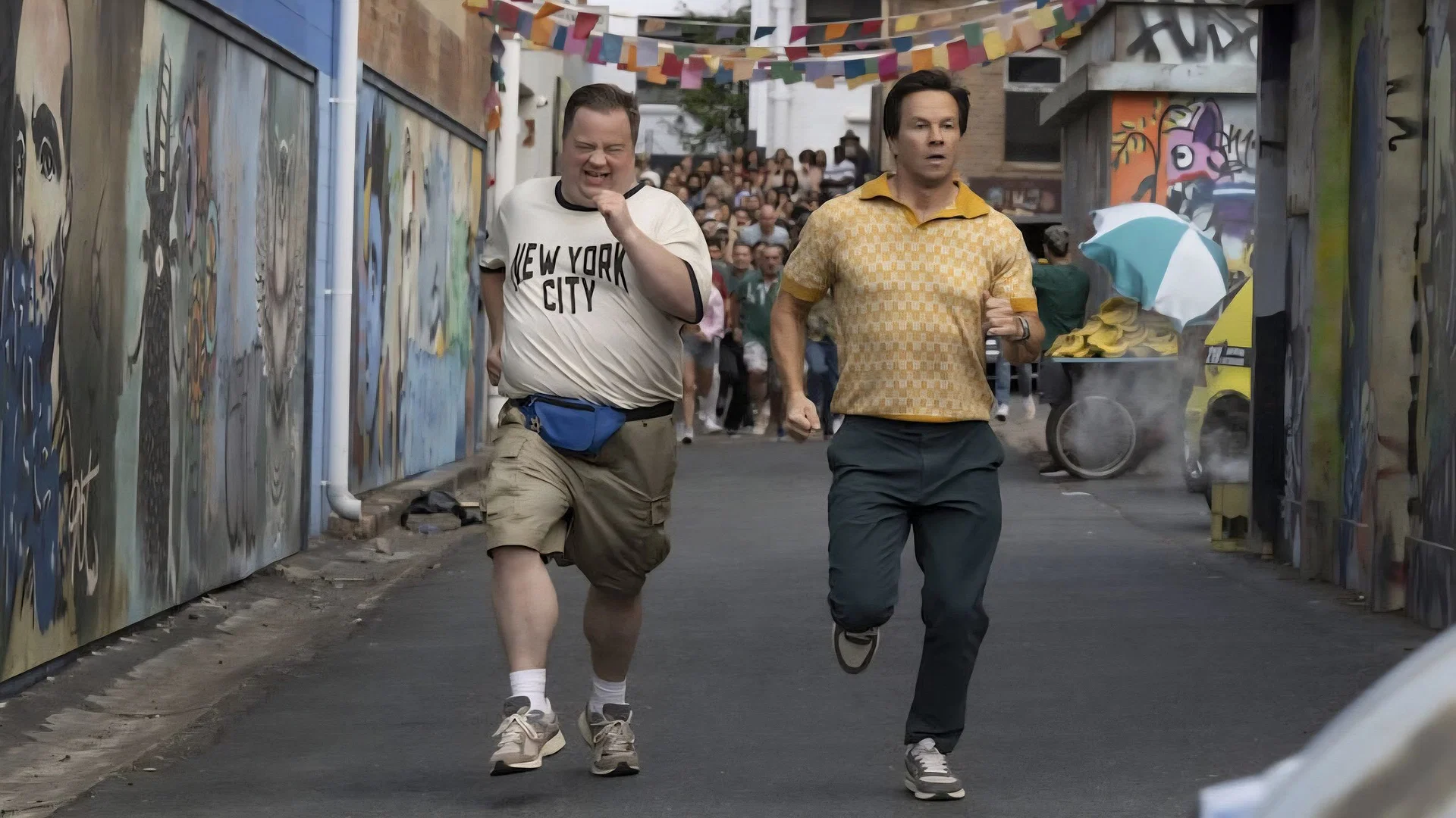 Balls Up Review — Wahlberg and Hauser Can’t Save Peter Farrelly’s Limp Comedy Lacking Cojones 9 Elijah Paul Walter Hauser and Brad Mark Wahlberg in BALLS UP Photo Credit Ben Rothstein Prime Video %C2%A9 Amazon Content Services LLC copy 1280x720 1 scaled