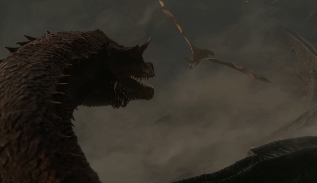 A dragon looking at another dragon fly