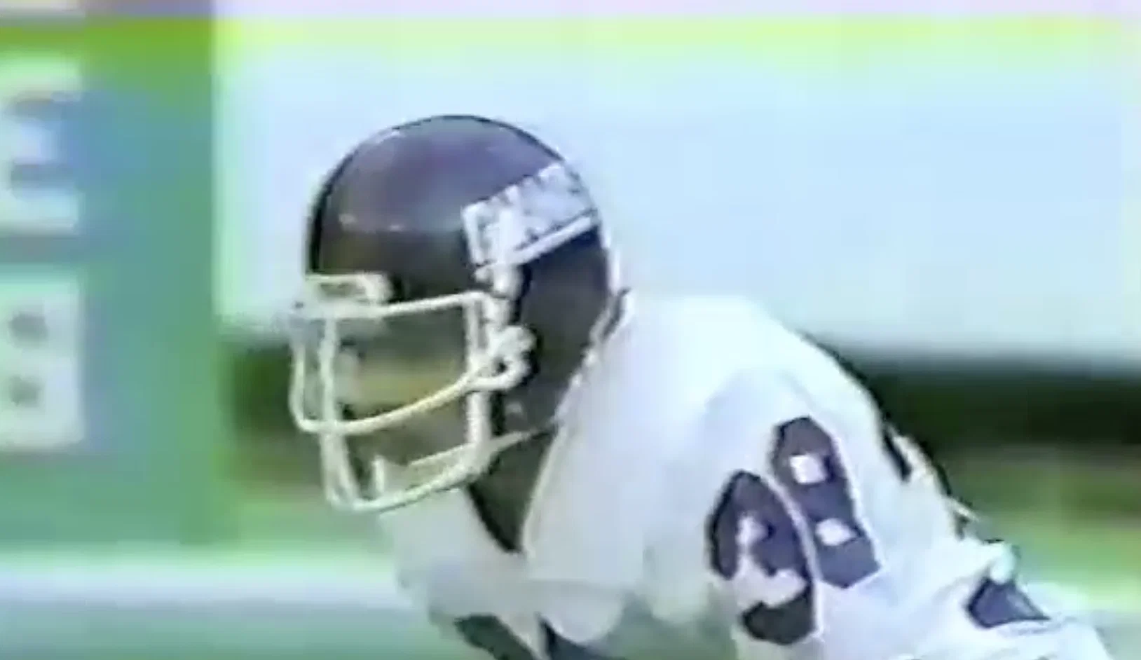 David Corenswet Stars as Real Life NFL Player in ‘Mr. Irrelevant’ Biopic 8 An old clip of John Tuggle, playing on the field