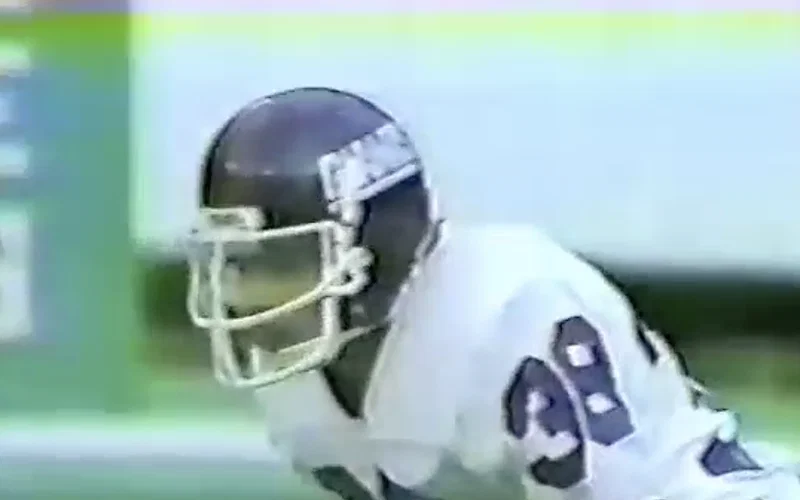 David Corenswet Stars as Real Life NFL Player in ‘Mr. Irrelevant’ Biopic 2 An old clip of John Tuggle, playing on the field