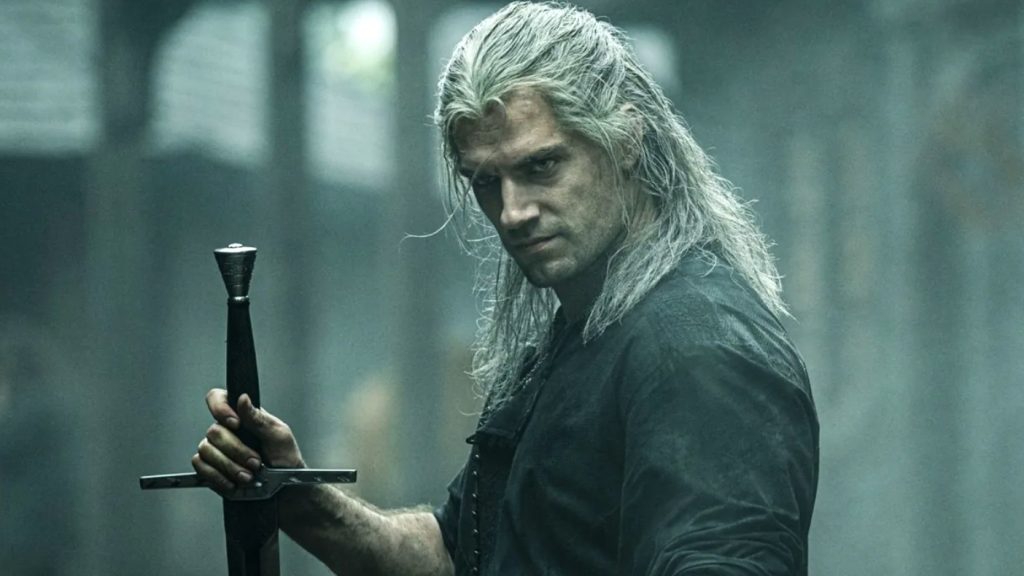 Henry Cavill as the Butcher of Blaviken holding his sword and looking with anger in The Witcher