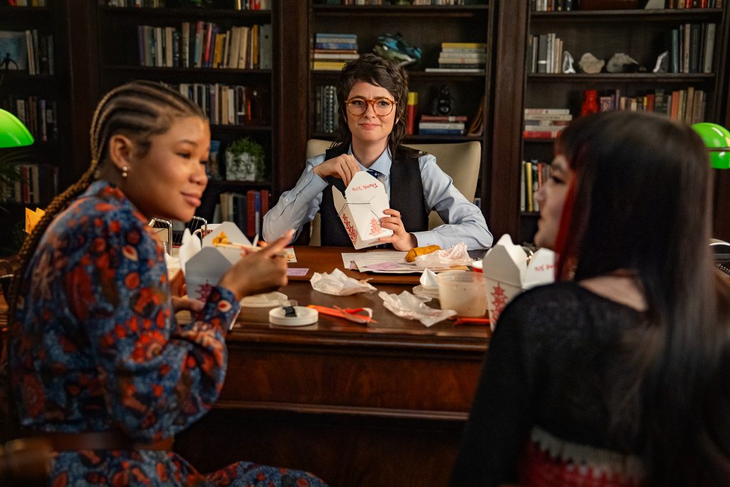 Storm Reid as Luna, Sarah Sherman as Dr. Schilling and Ivy Wolk as Auguste in Roommates, inside a office. 