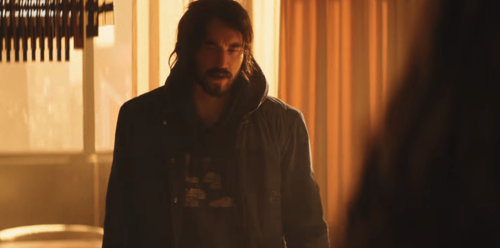 Andrew Koji in a black attire 