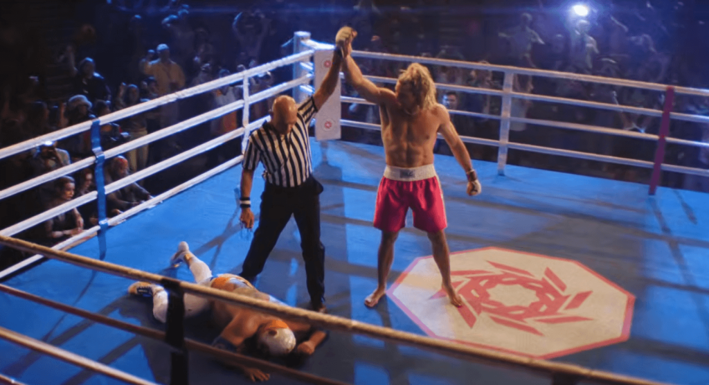 Noah Centineo's Ken standing in the ring as a winner 