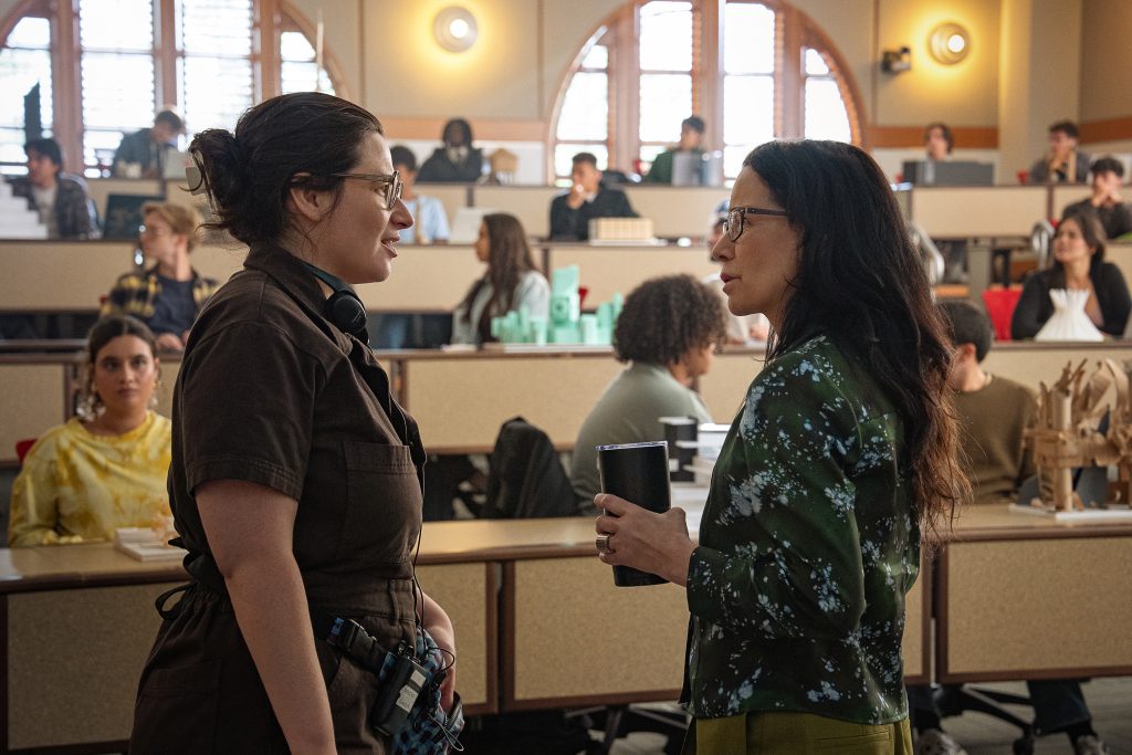 ROOMMATES. (L to R) Director Chandler Levack and Janeane Garofalo as Professor Zieman on the set of Roommates. Cr. Scott Yamano/Netflix © 2026.